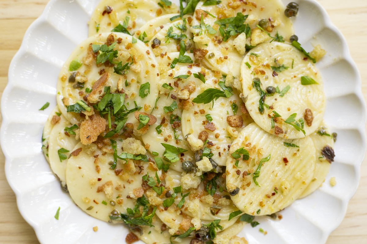Corzetti with Herby Lemon Anchovy Butter