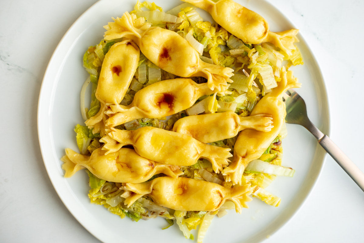 Taleggio Caramelle with Cabbage and Leeks