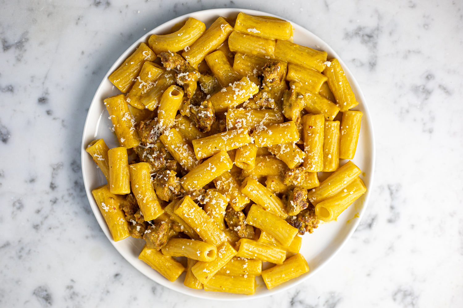 Rigatoni with Yellow Pepper Sauce and Spicy Sausage - qbcucina.com