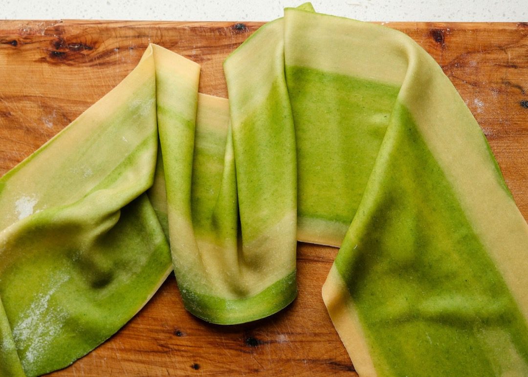 green and yellow marbled pasta dough